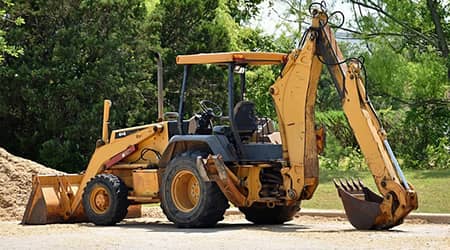 Zdjęcie koparko-ładowarki.